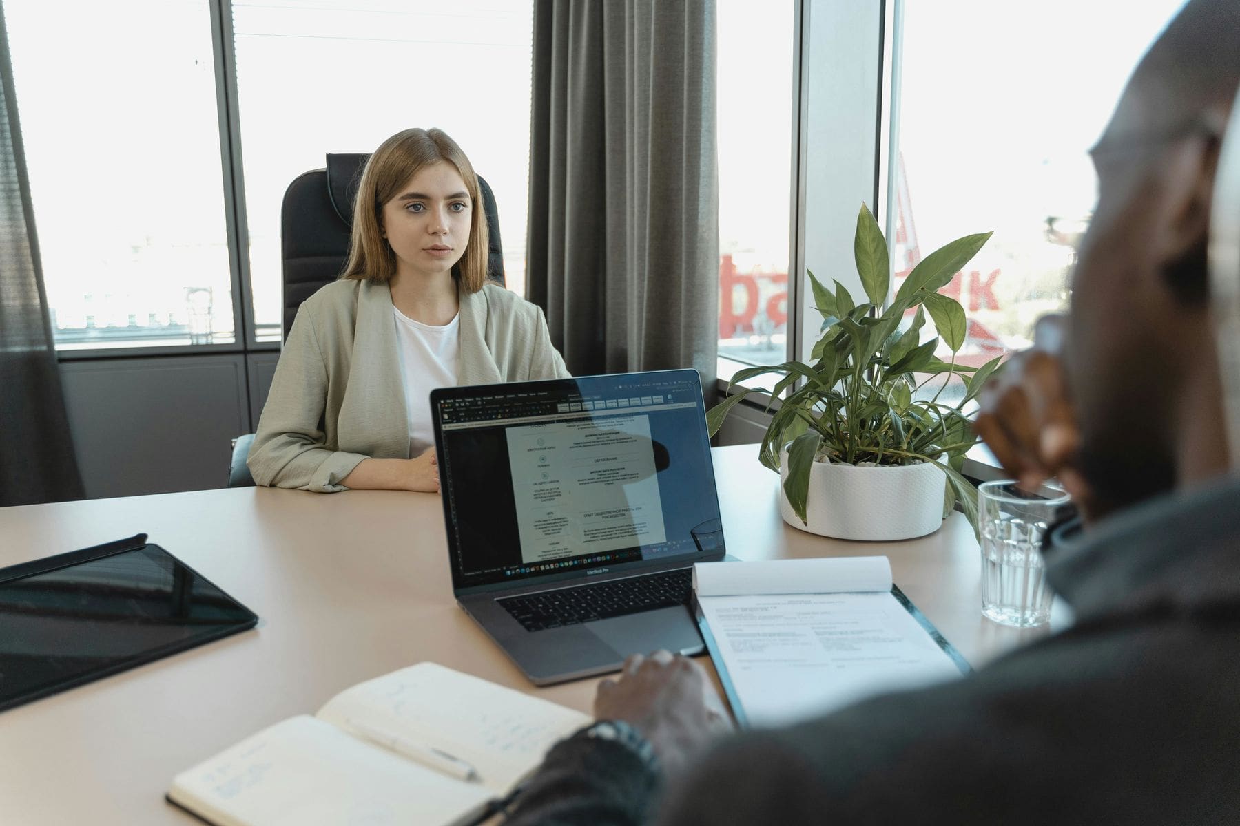 Woman looking intently at her interviewer during a job interview