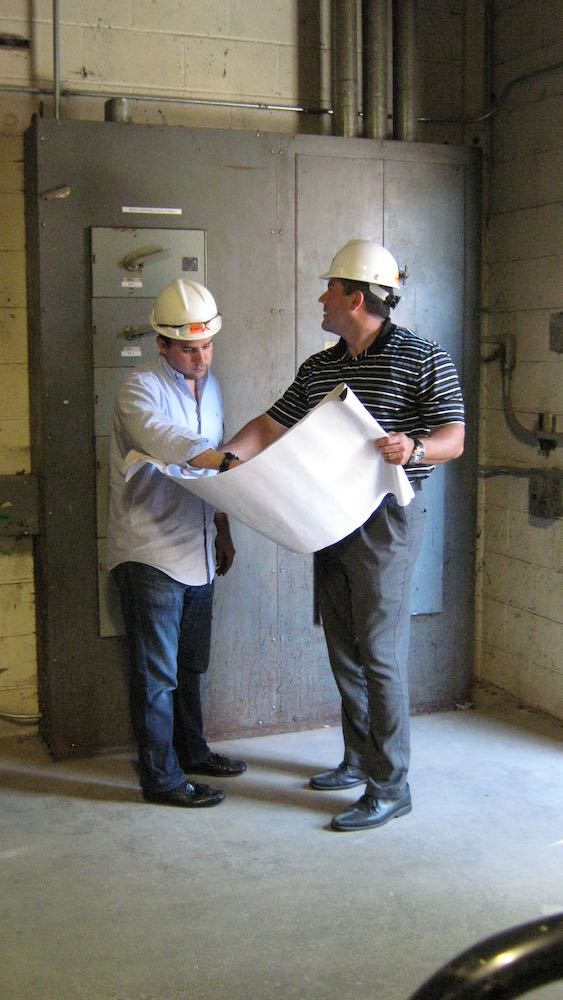 Chris and Chuck reviewing electrical panel