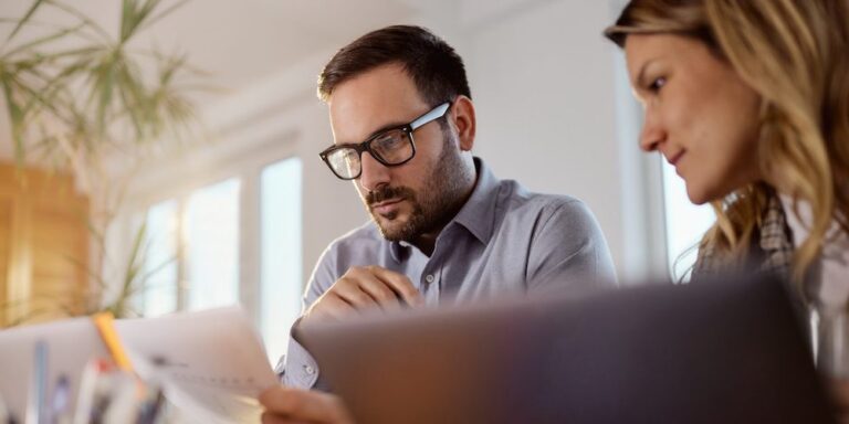 Photo of man reviewing documents